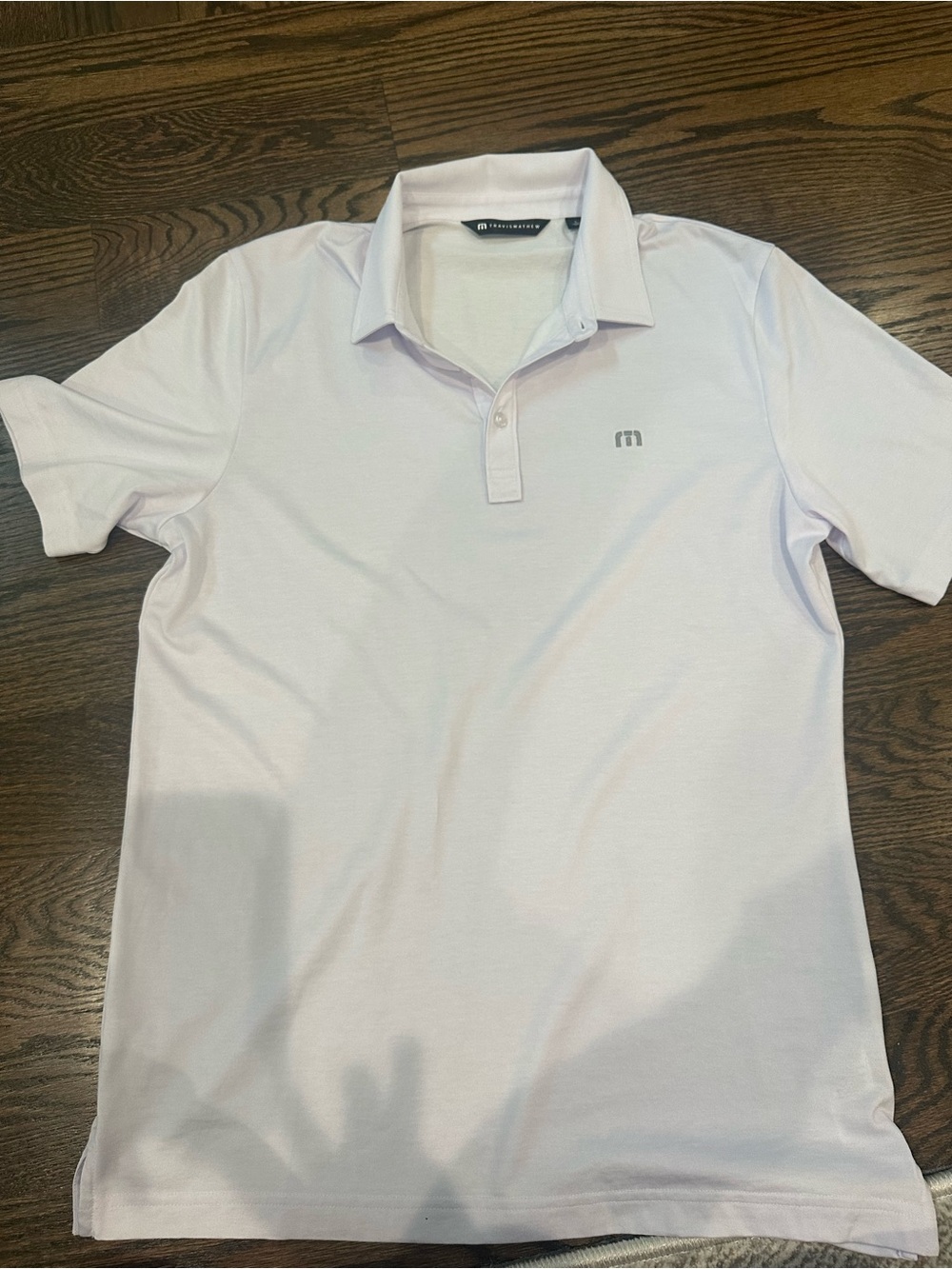 Travis Mathew Men’s White Polo Shirt with Subtle Logo